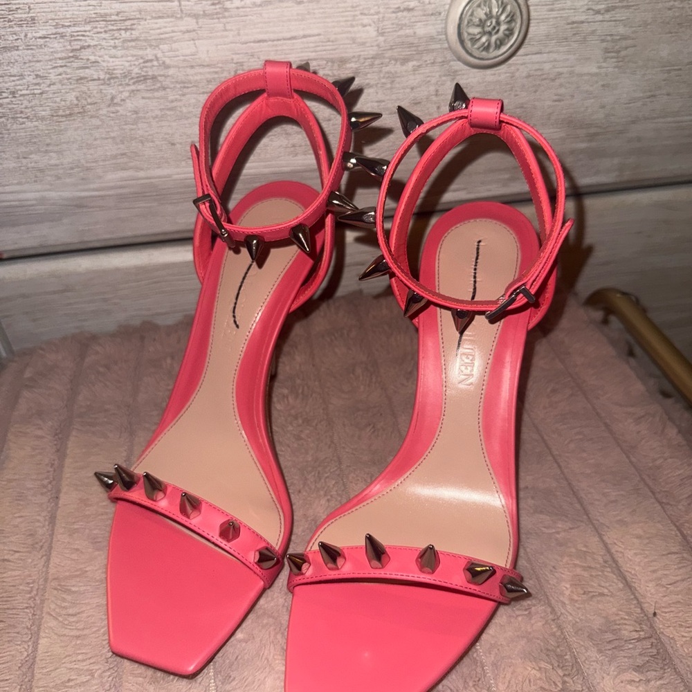 Alexander McQueen punk stud leather heels.